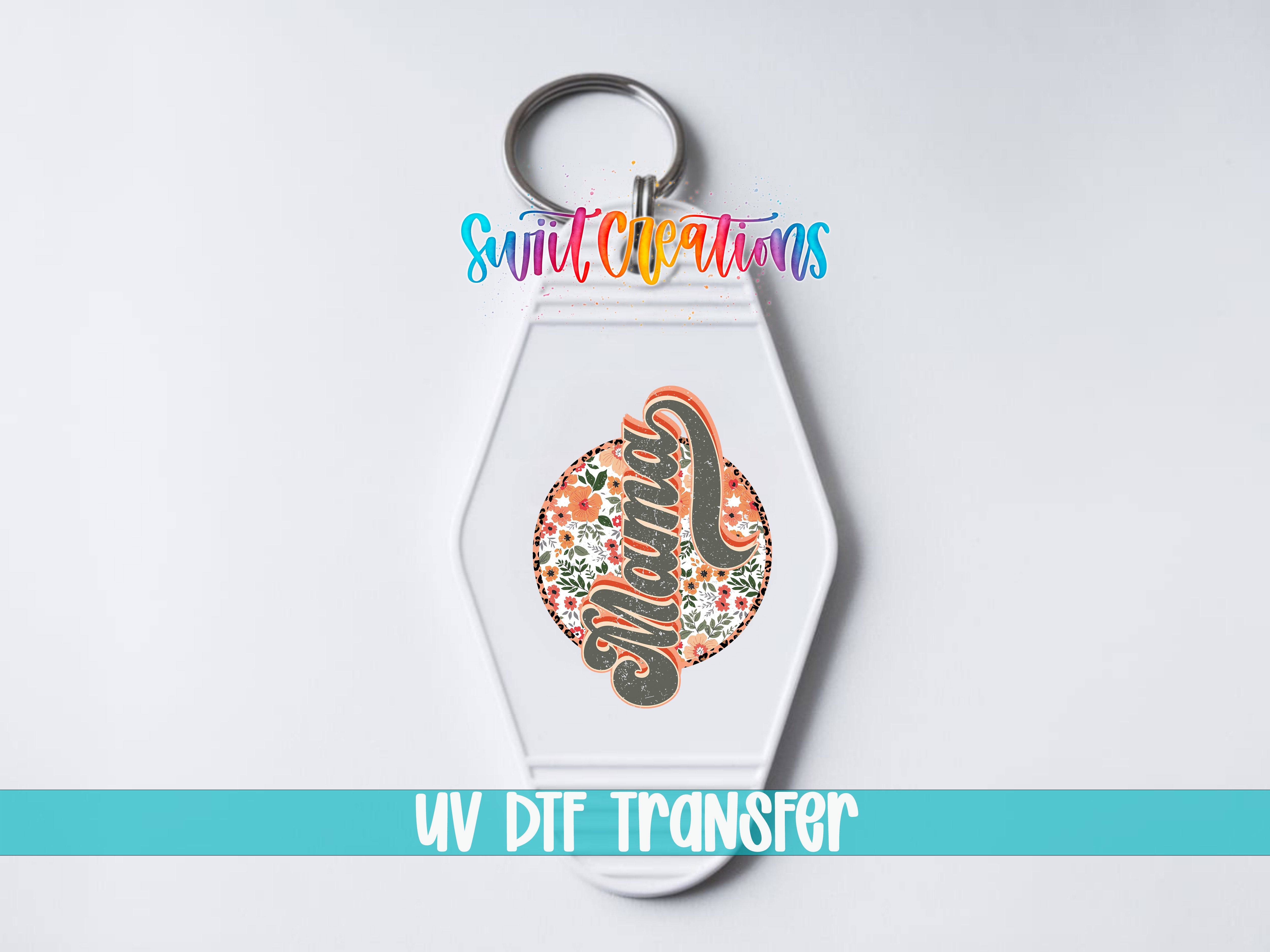 A keychain with a floral design and the word "Mama" printed on it, along with a keyring and a text overlay that says "Sunlit Creations UV DDF Transfers".