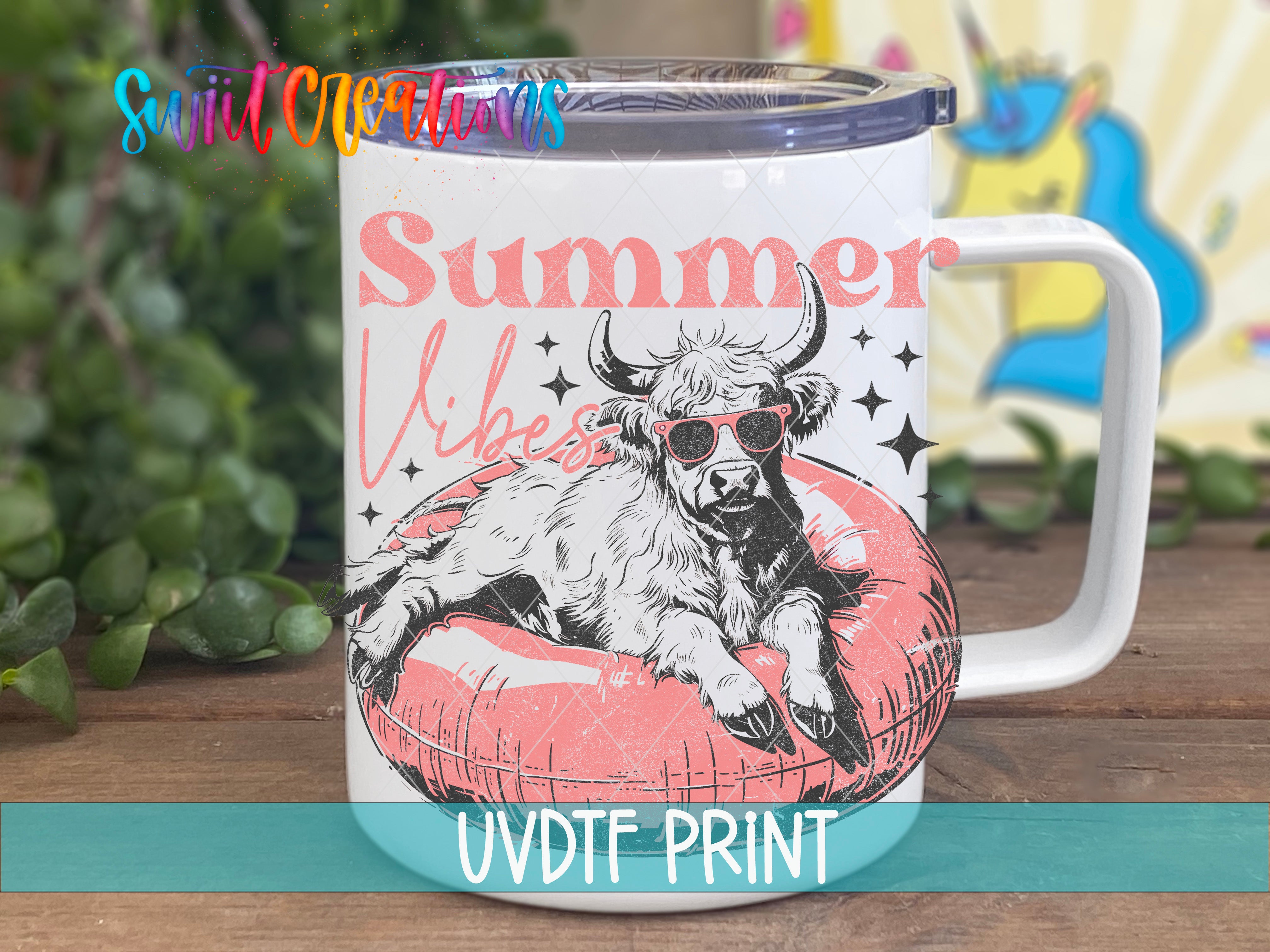 a white and blue coffee mug with a picture of a bull on it