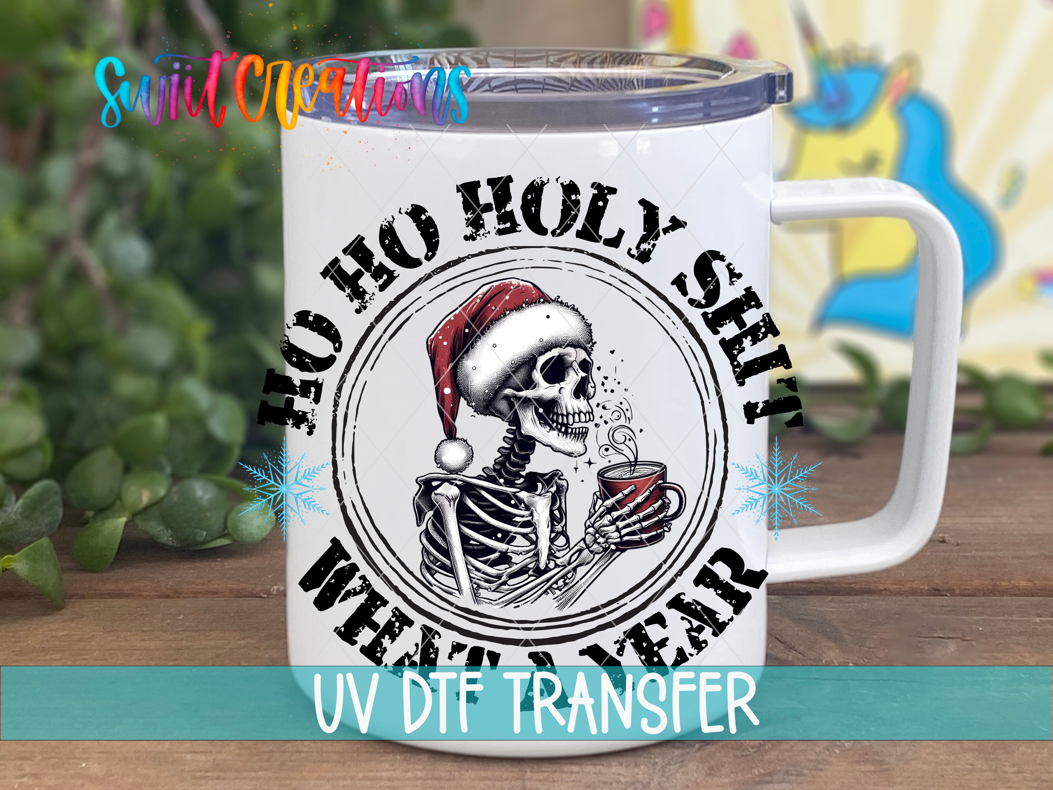 A white mug with a black and white illustration of a skeleton wearing a Santa hat and holding a cup of coffee. The mug has a lid and a handle.