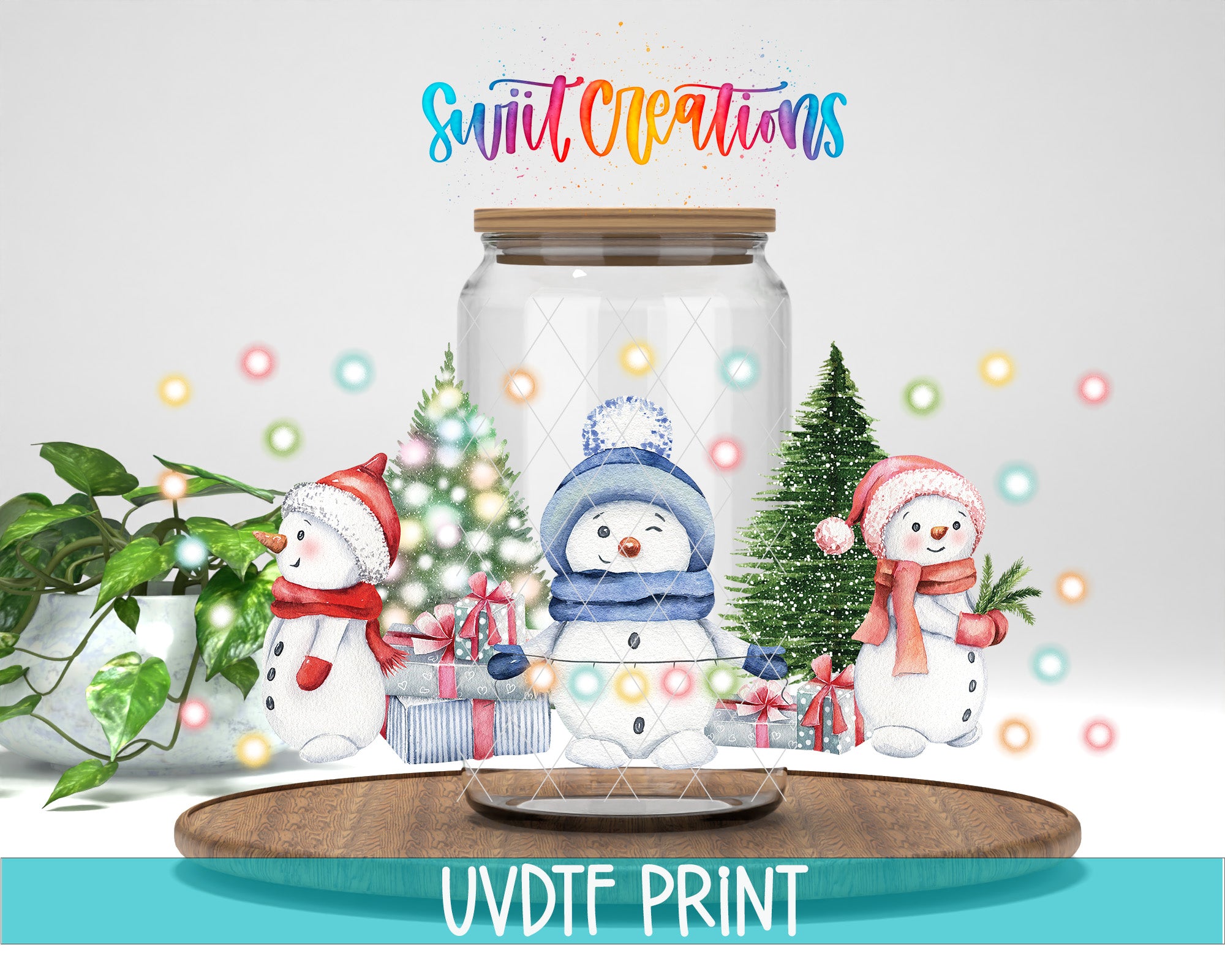 A glass jar containing three cheerful snowmen, each wearing a different colored scarf, surrounded by a festive Christmas tree and presents. The text "Swift Creations" is written above the jar, and the phrase "UVDF PRINT" is written at the bottom of the image.