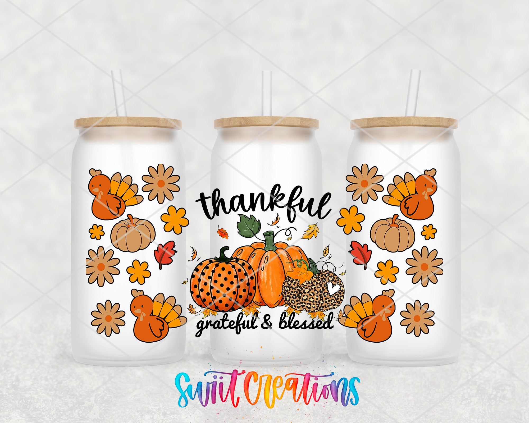 three white tumblers with autumn-themed designs, including pumpkins, turkeys, and flowers. Each tumbler has a straw and a lid. The text on the tumblers reads "Thankful" and "grateful & Blessed".