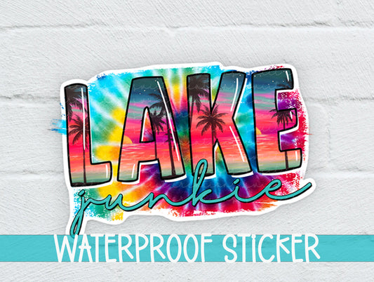 a sticker that says lake paradise on a white brick wall