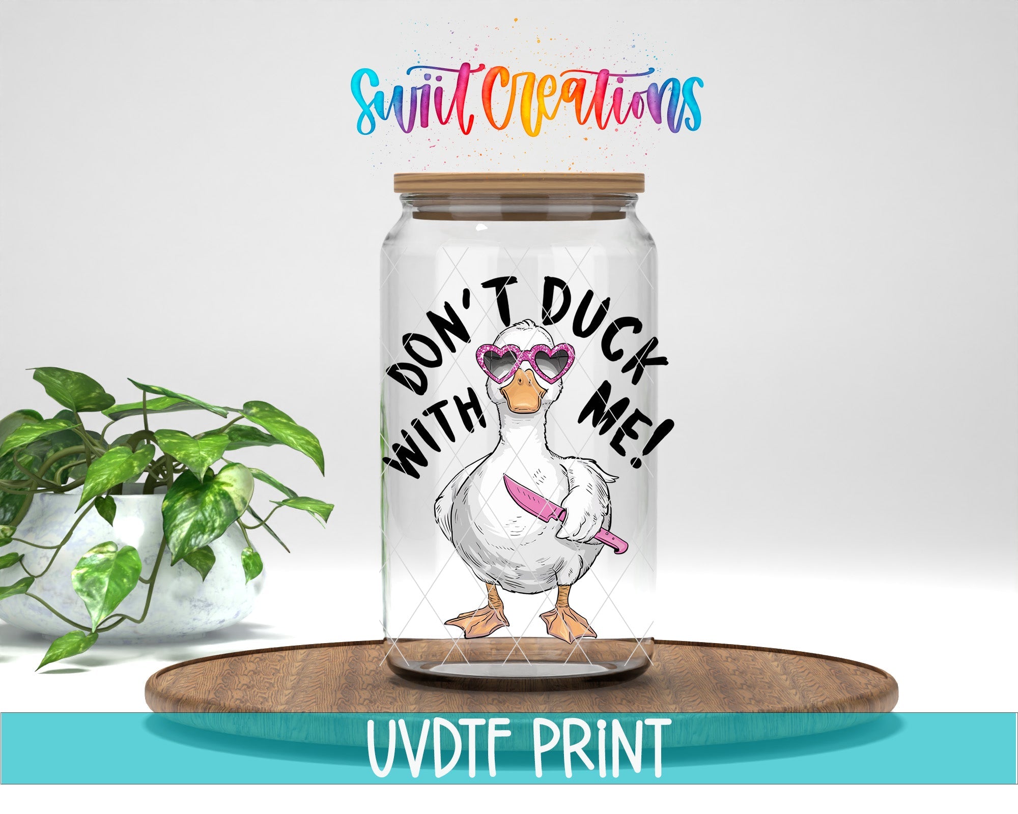 a glass jar with a picture of a duck wearing sunglasses