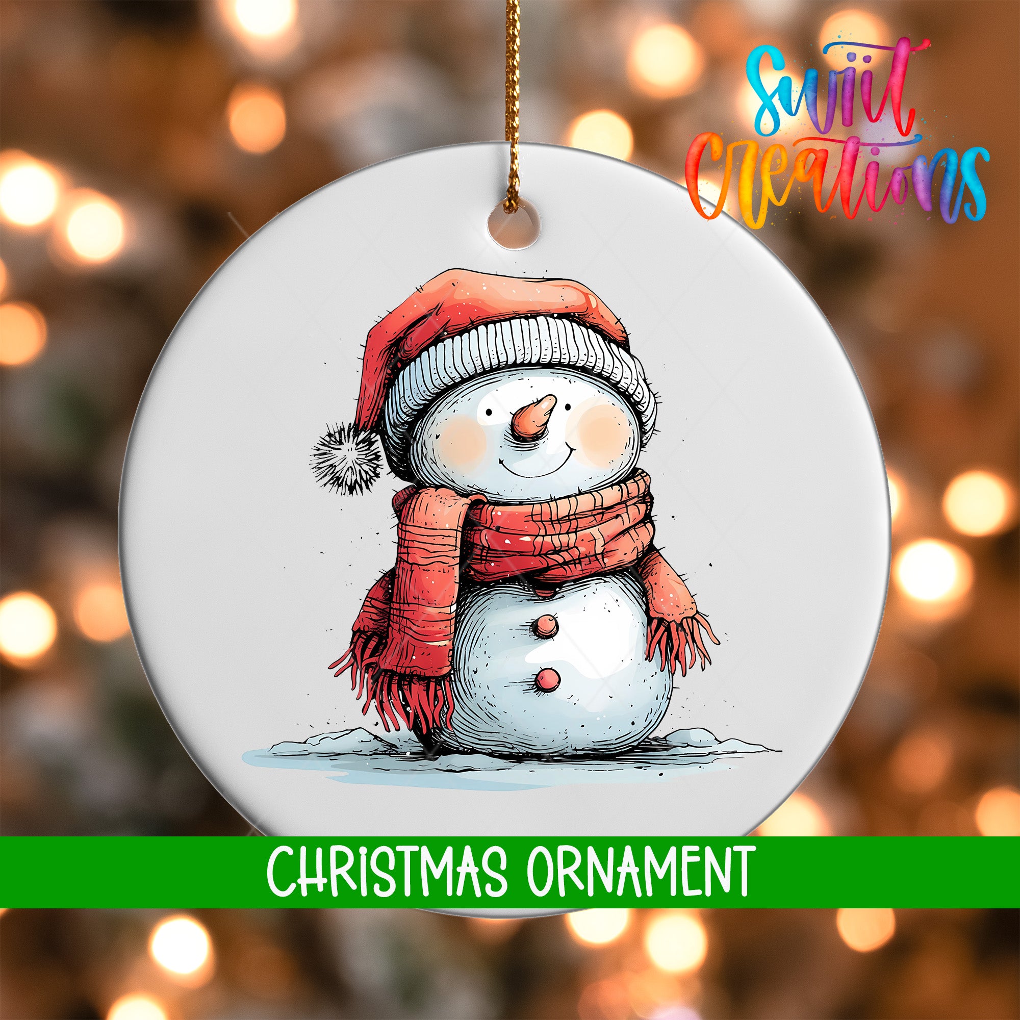 A white Christmas ornament featuring a snowman wearing a red scarf and hat, with a green ribbon around its neck.