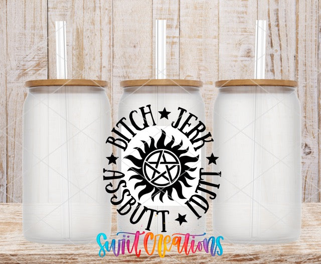 two white tumblers with a black and white design on them