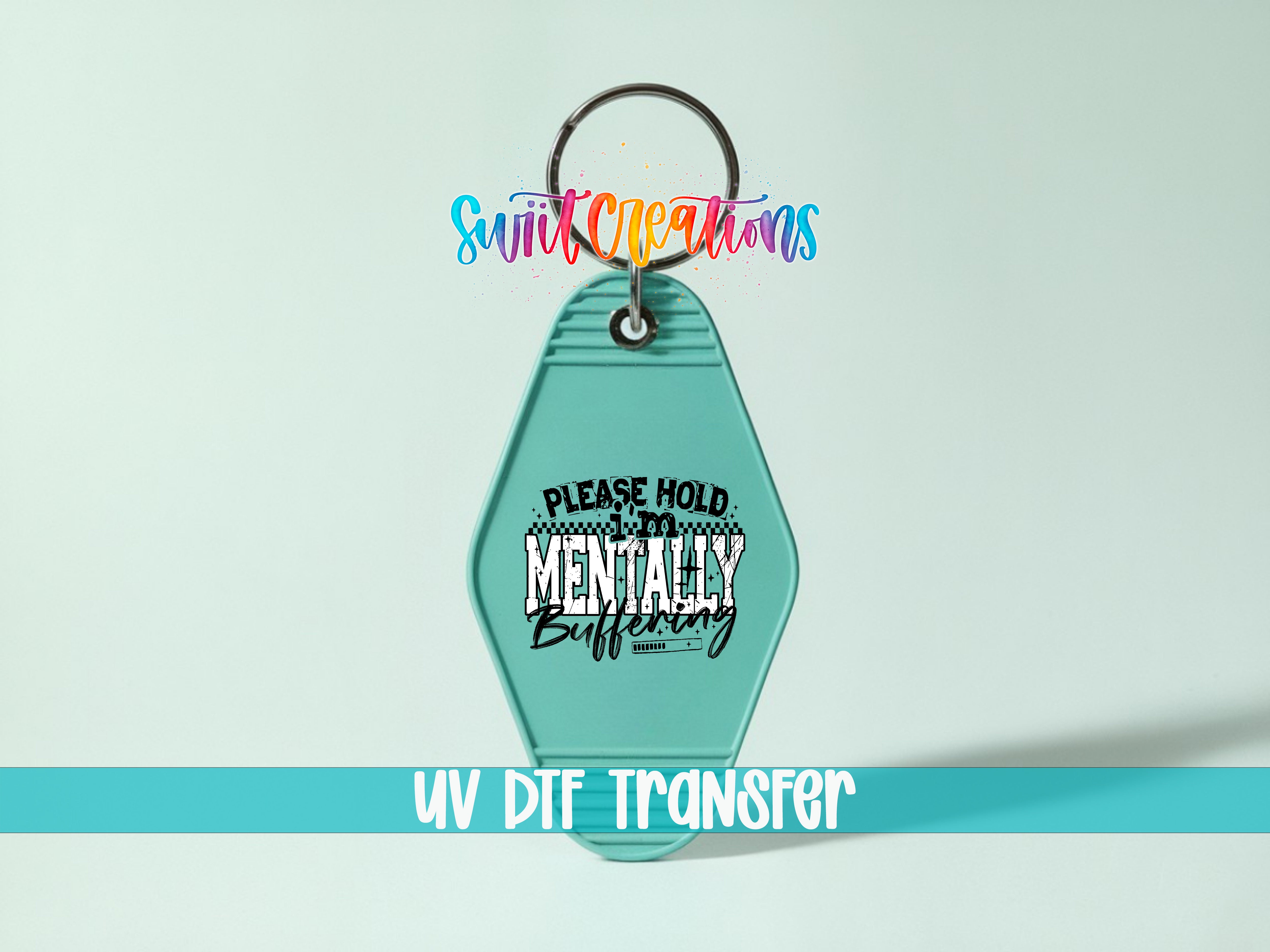 A keychain with a message printed on it, along with a colorful logo above it.