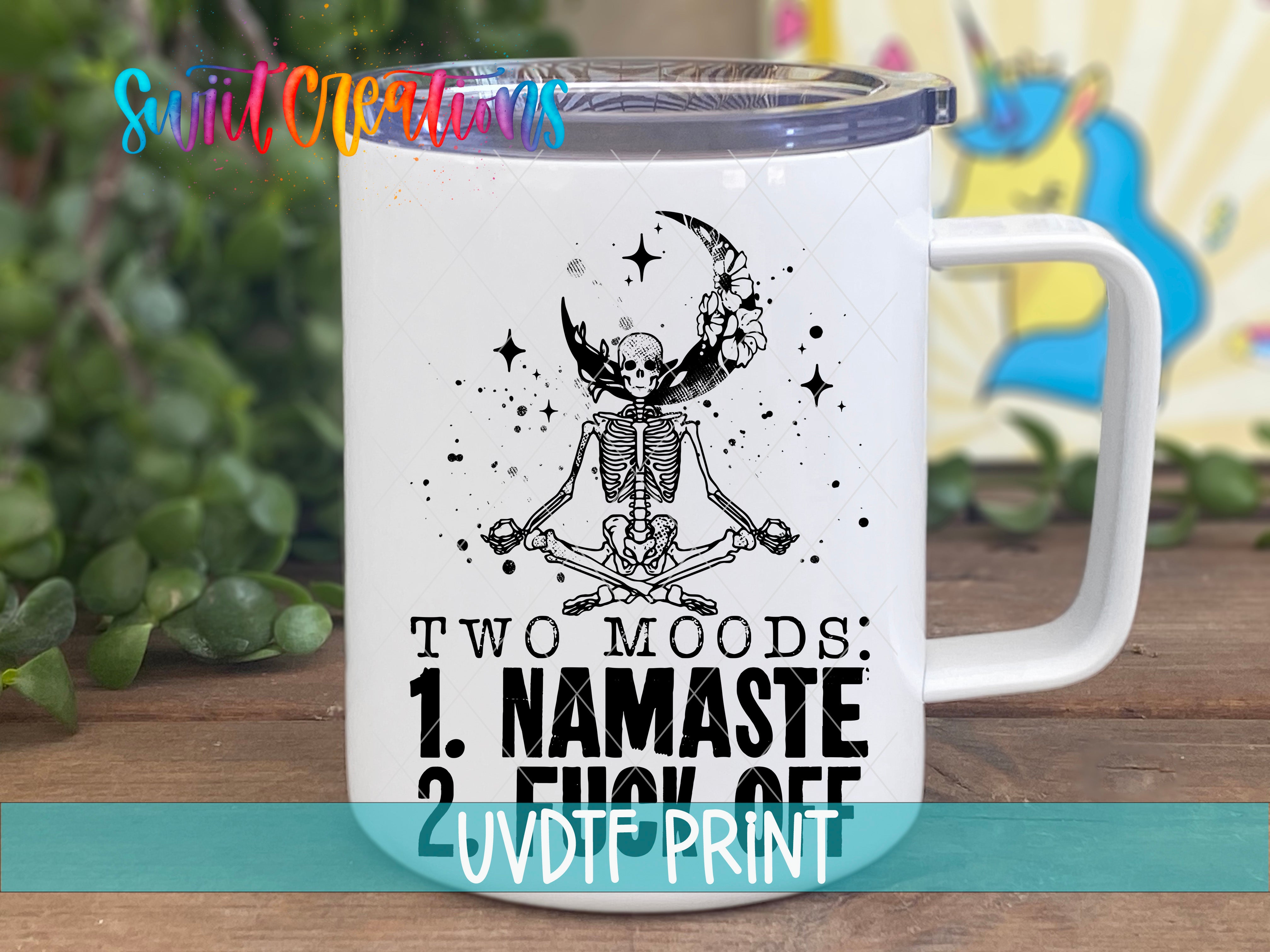 a white coffee mug with a skeleton on it