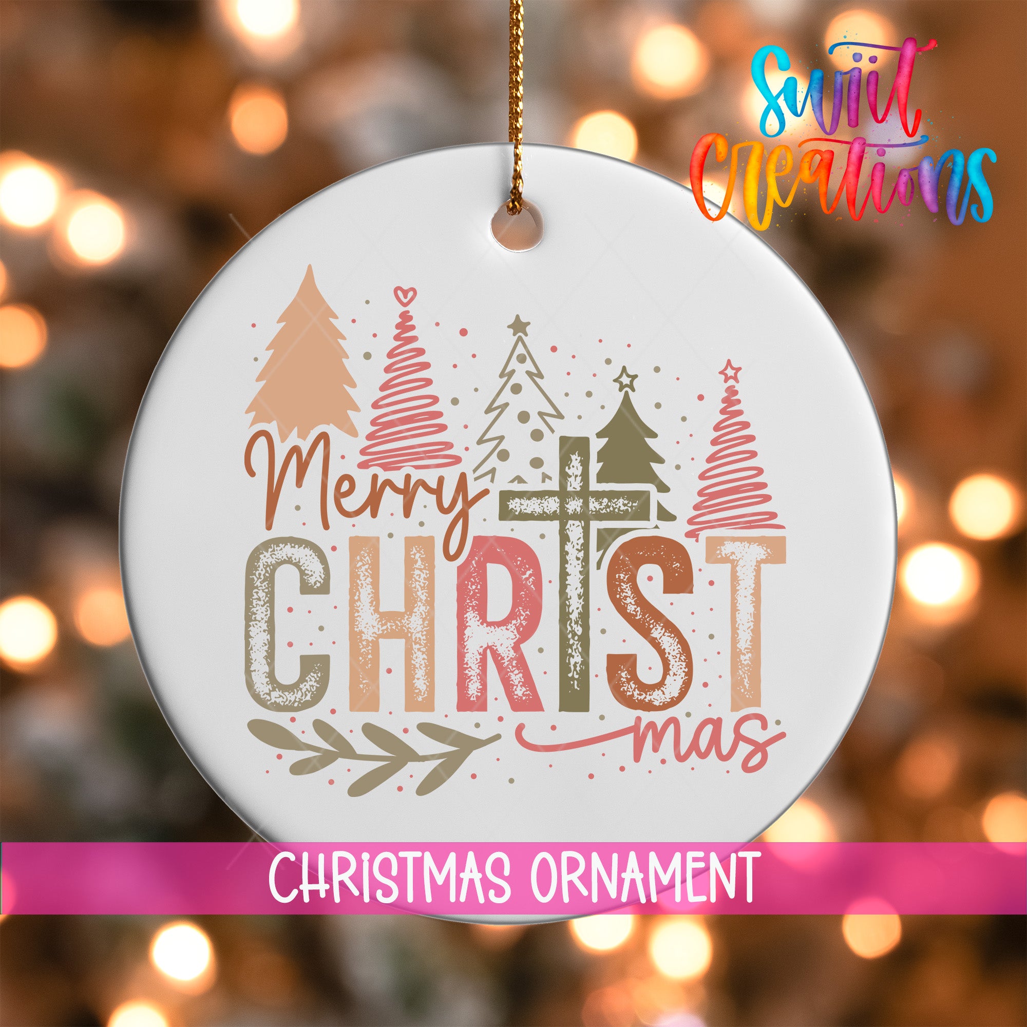 A white Christmas ornament with the text "Merry Christmas" and "Christmas" written on it, along with decorative Christmas trees and ornaments.