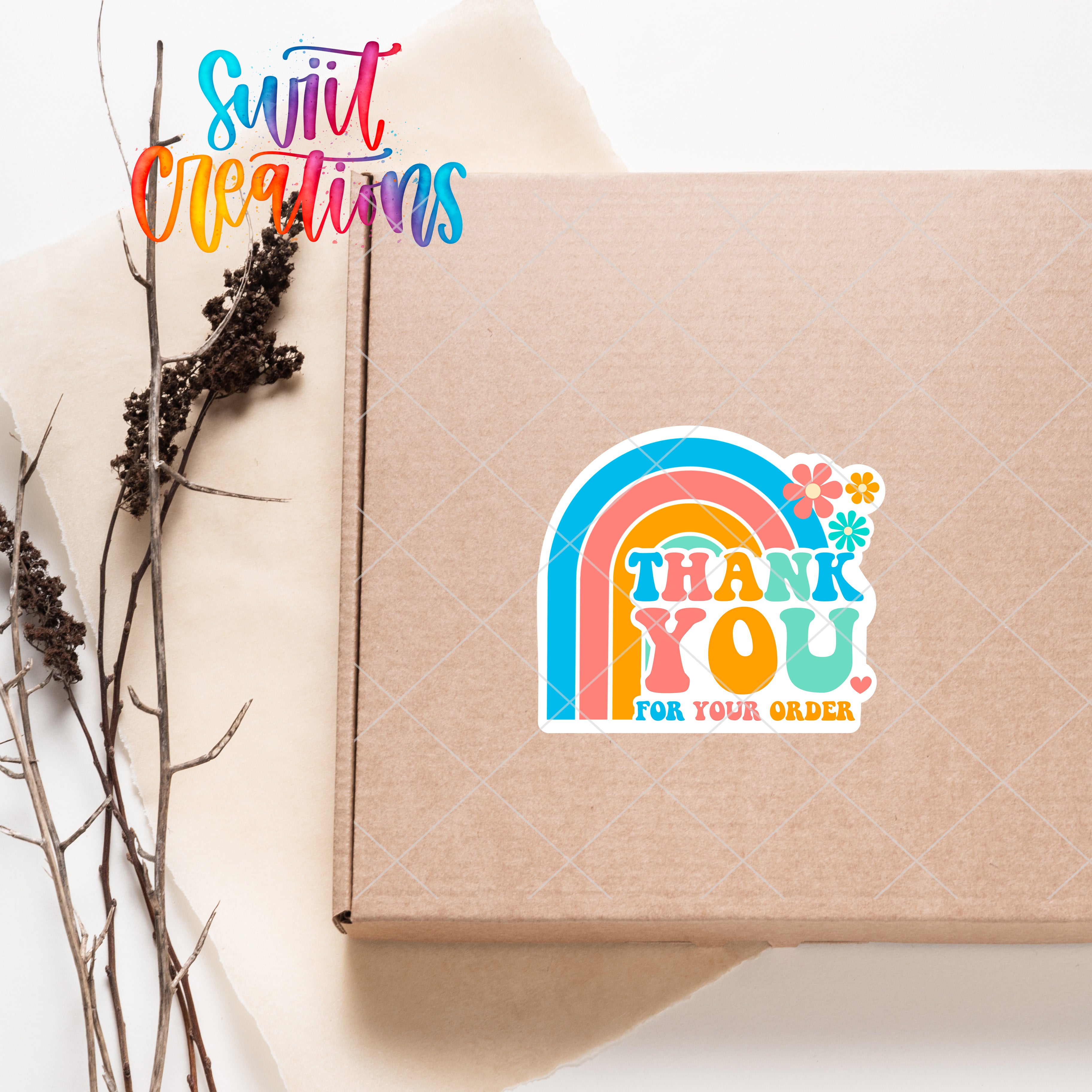 a box with a thank you sticker on it