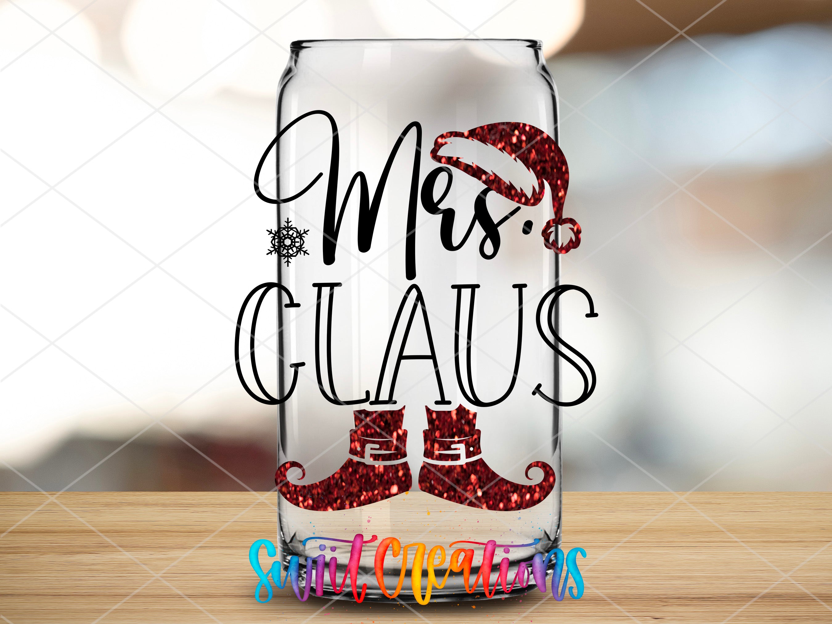 a glass with the words mrs claus on it