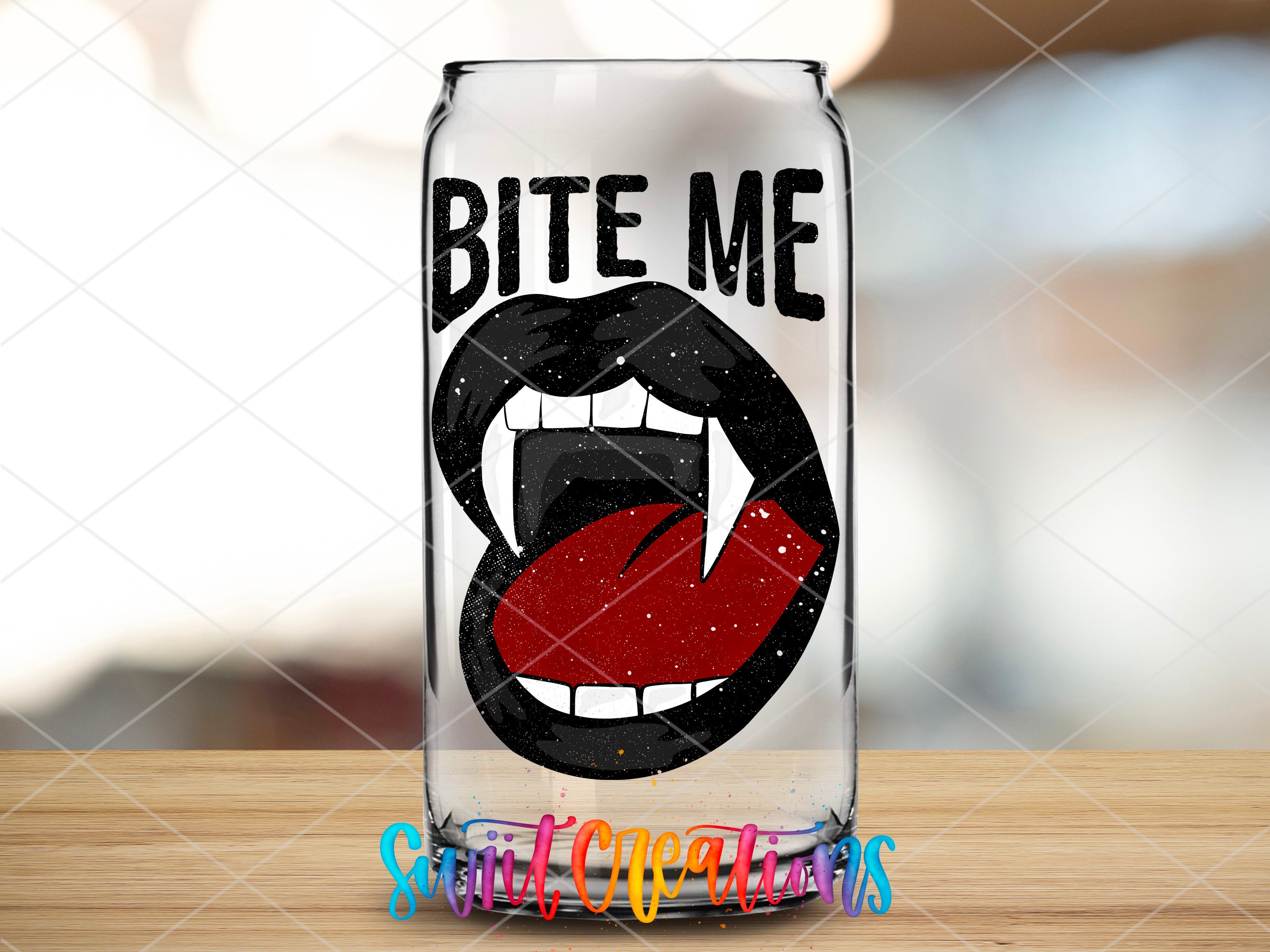 a glass with a mouth and tongue on it