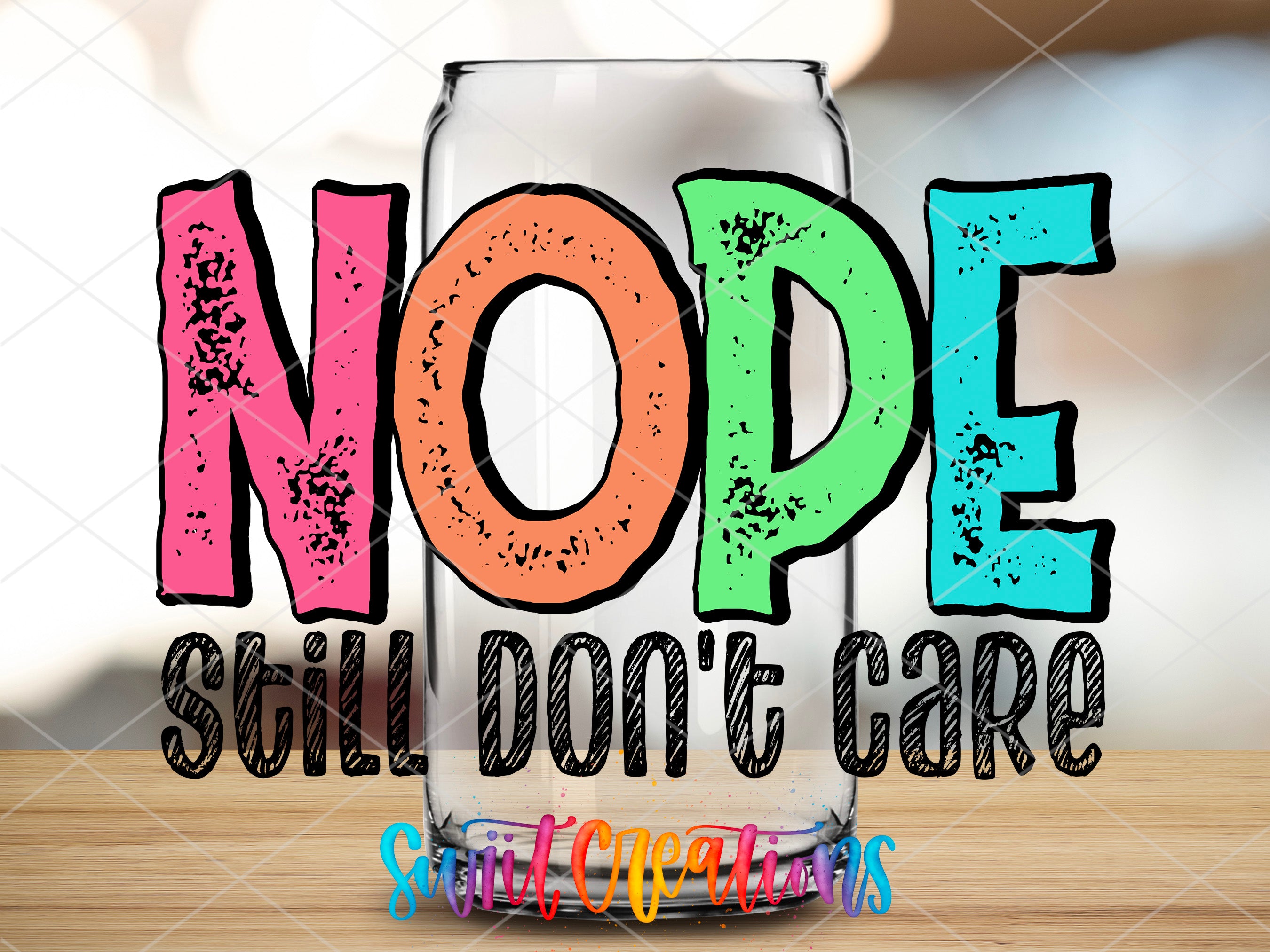 a glass with the words nope, smile, don't care on it