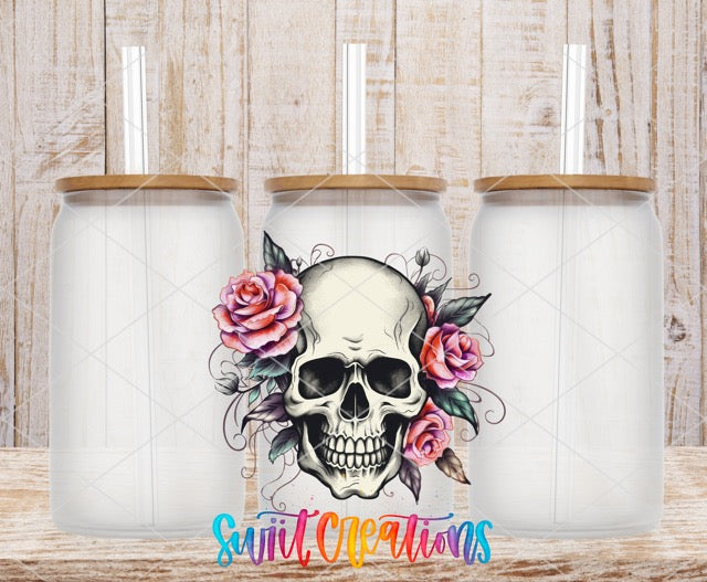 two skulls with roses on their heads with the words saint creations