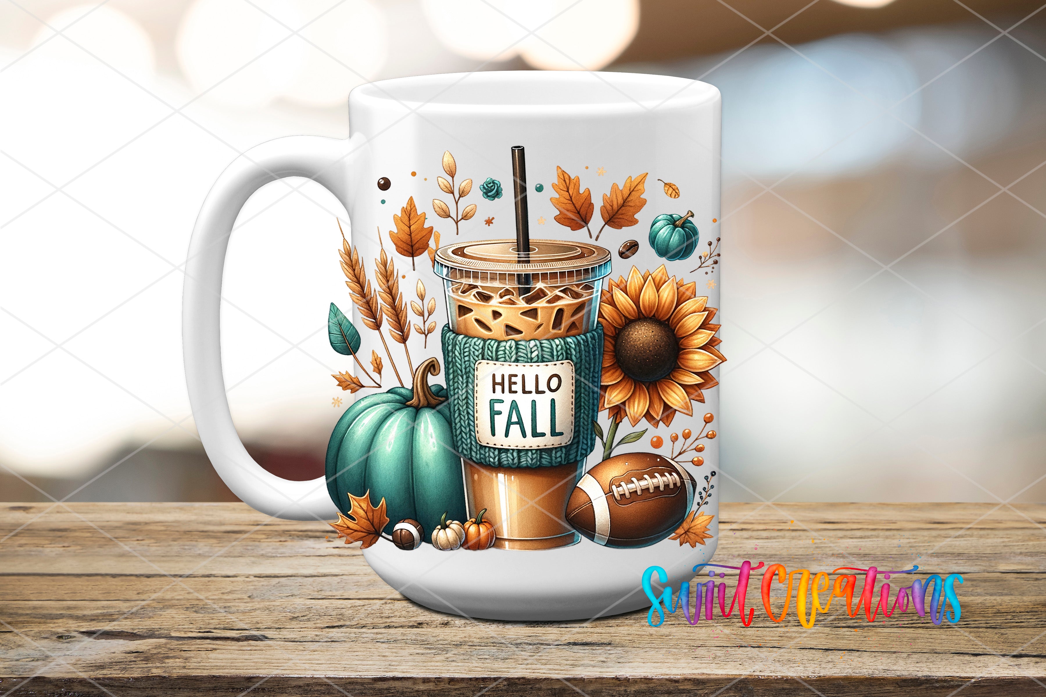 A white mug with a colorful autumn-themed design featuring a coffee drink, pumpkins, sunflowers, and other fall-themed elements.