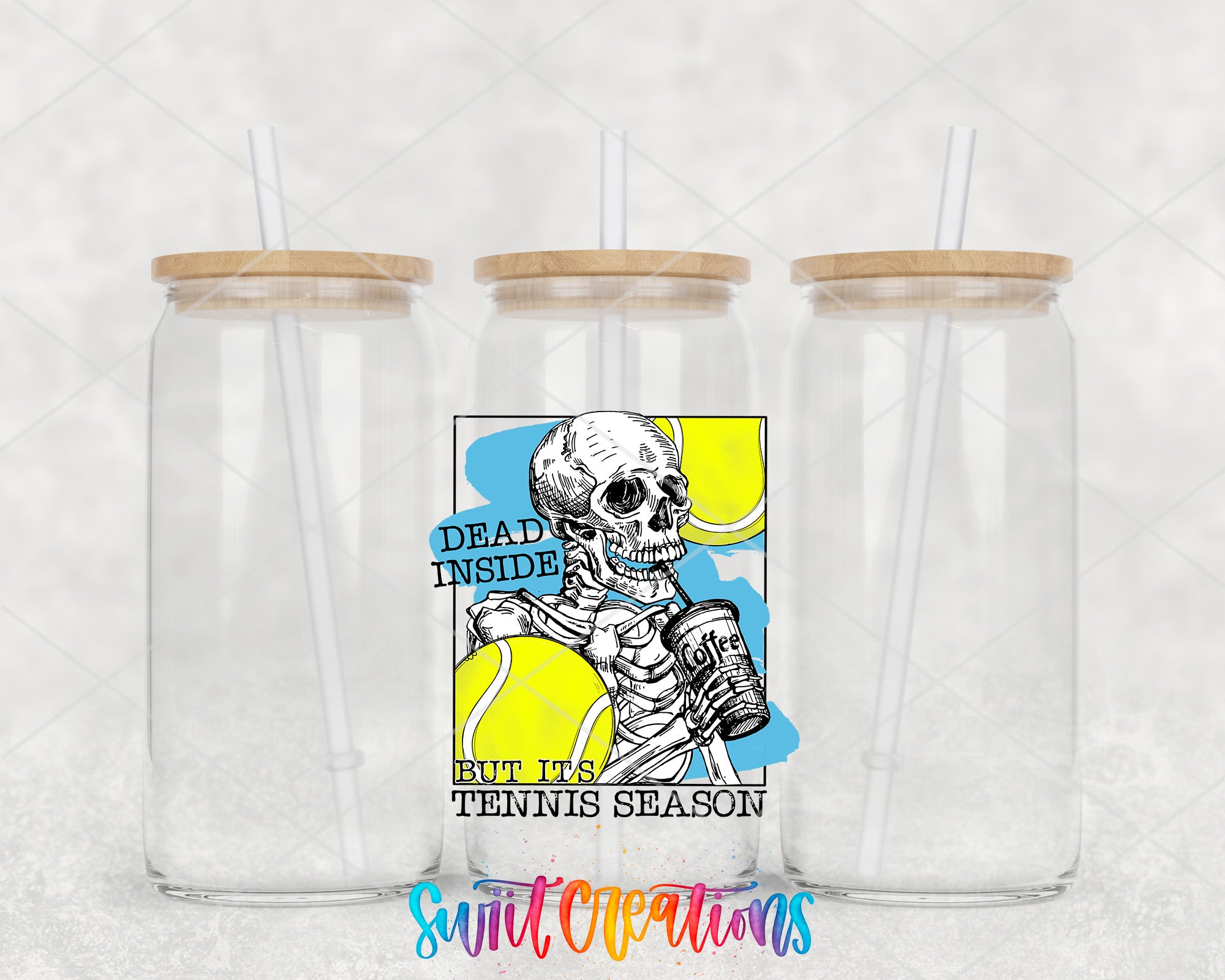 a couple of glasses with a skeleton on them