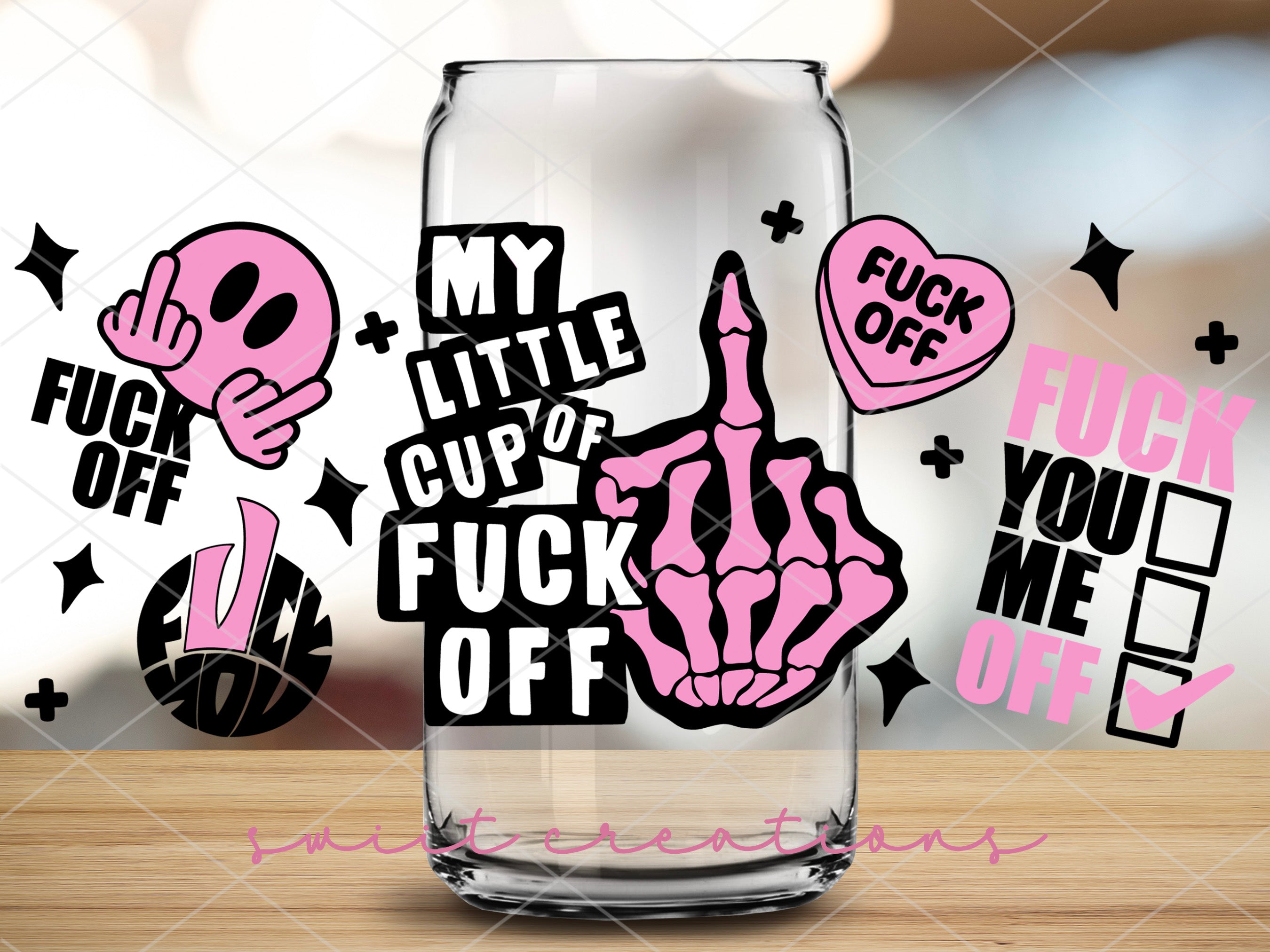 a glass with some stickers on it