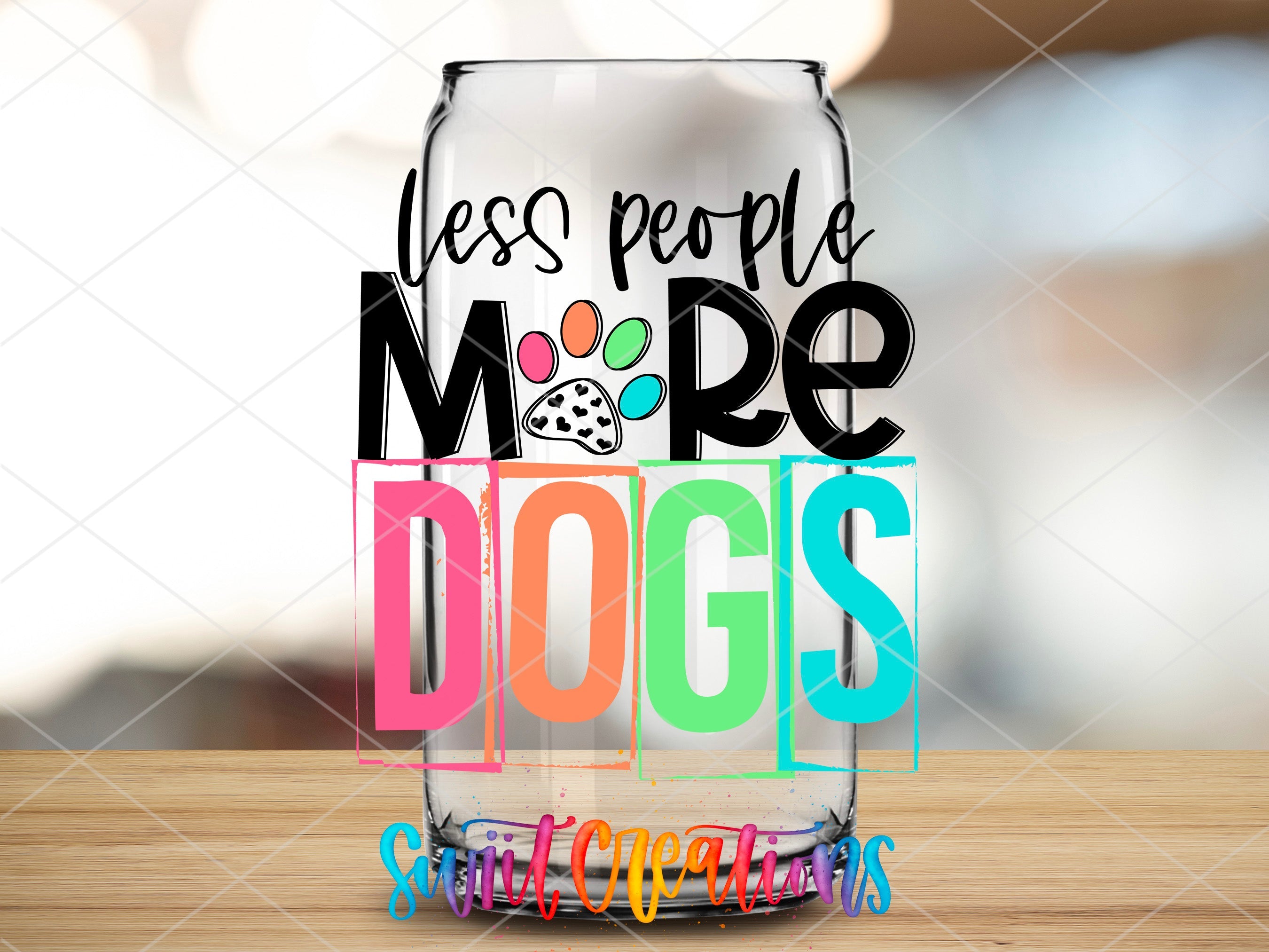 a glass with the words less people more dogs on it
