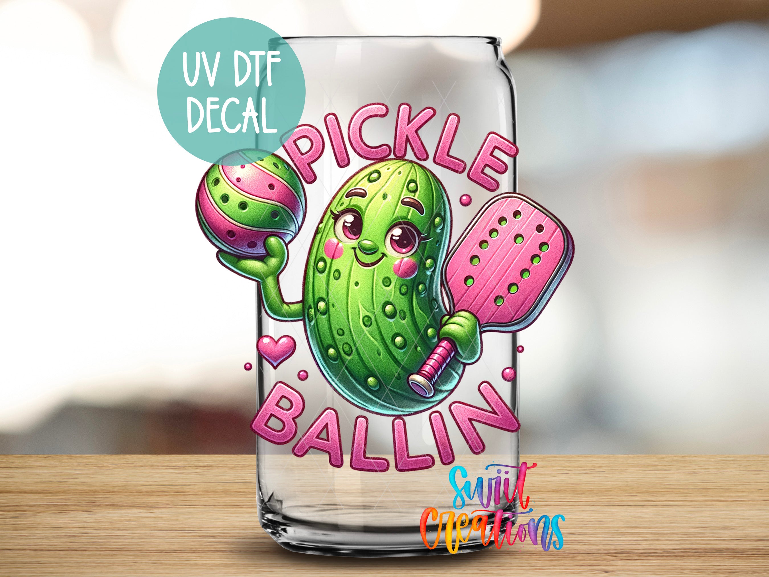 a picture of a pickle ballin glass on a table