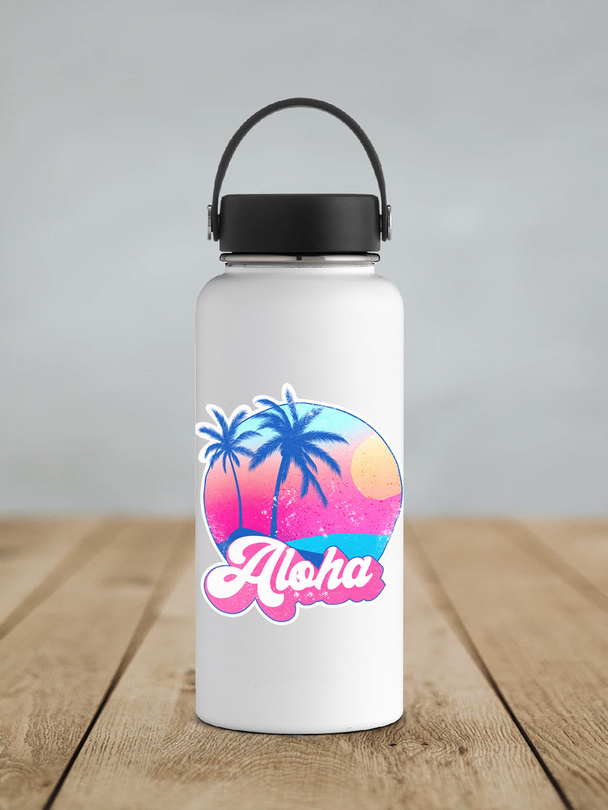 Aloha sticker on a white insulated water bottle