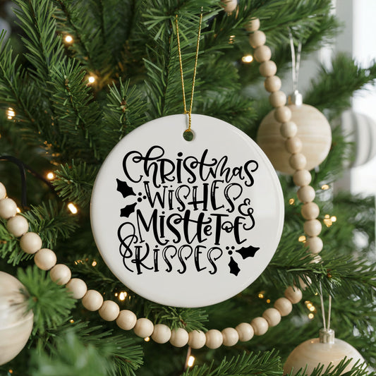 Christmas Wishes and Mistletoe Kisses ceramic Christmas ornament, front view
