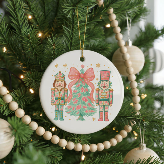 Pink Nutcrackers with Christmas Tree ceramic Christmas ornament, front view