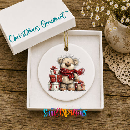 teddy bear with a red scarf and Christmas gifts ceramic Christmas ornament presented in a gift box