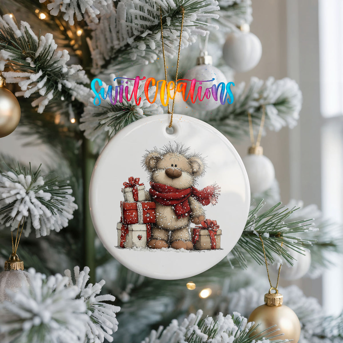 teddy bear with a red scarf and Christmas gifts ceramic Christmas ornament hanging on a frosted Christmas tree