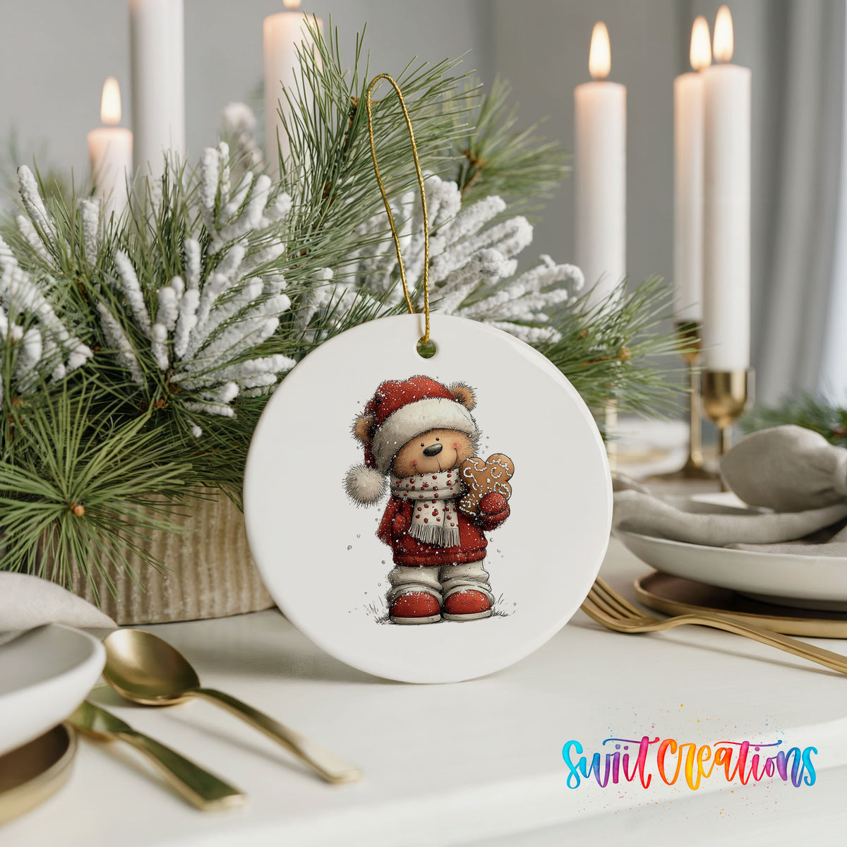 teddy bear in a Santa hat holding a gingerbread cookie ceramic Christmas ornament shown in a holiday table setting