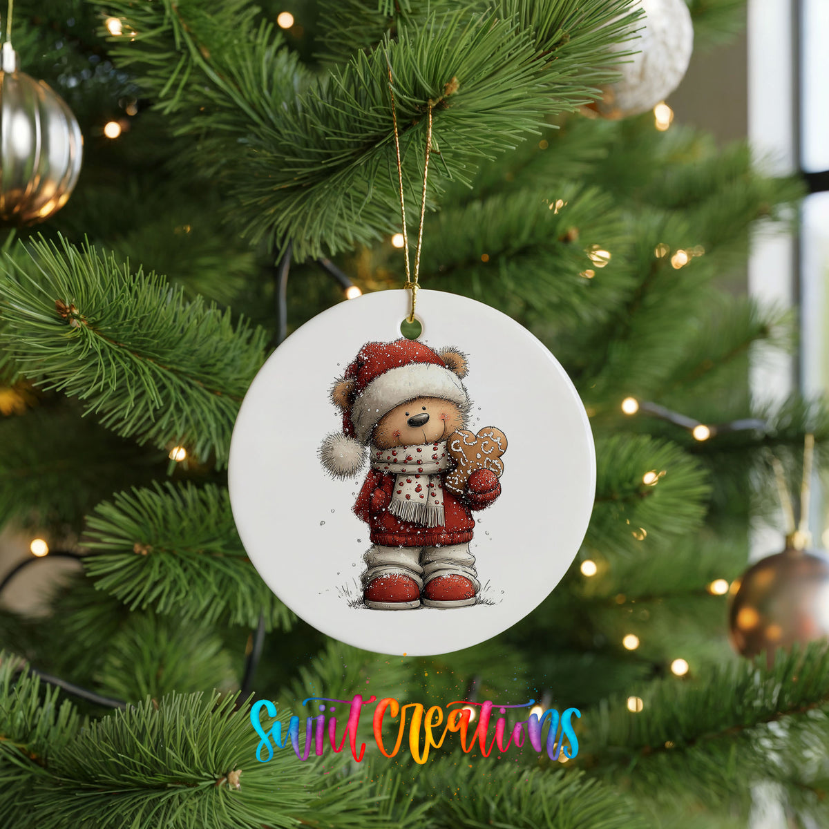 teddy bear in a Santa hat holding a gingerbread cookie ceramic Christmas ornament hanging on a lit Christmas tree