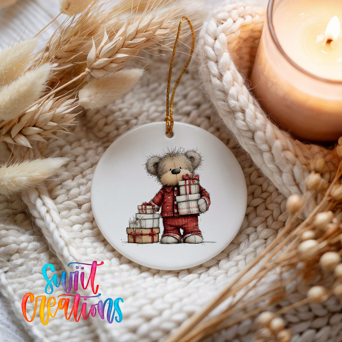teddy bear carrying a stack of Christmas gifts ceramic Christmas ornament styled on a cozy knit blanket