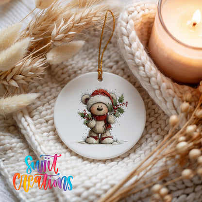 teddy bear framed by a Christmas wreath ceramic Christmas ornament styled on a cozy knit blanket