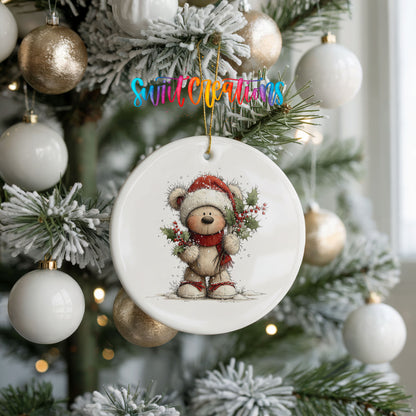 teddy bear framed by a Christmas wreath ceramic Christmas ornament hanging on a frosted tree with ornaments