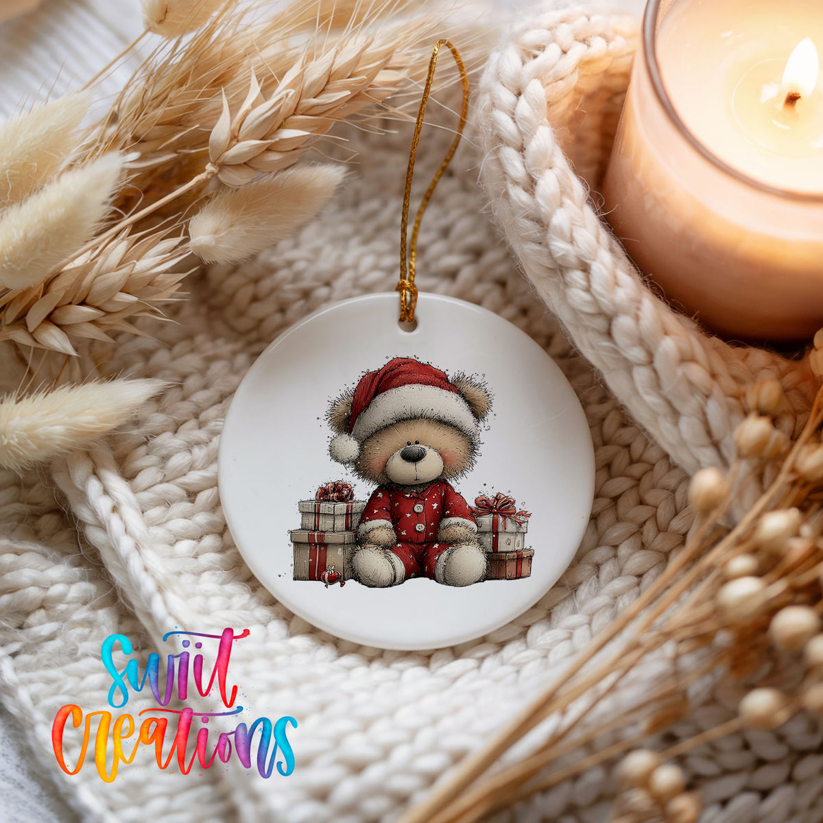 seated teddy bear with Christmas gifts ceramic Christmas ornament styled on a cozy knit blanket