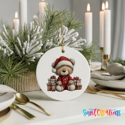 seated teddy bear with Christmas gifts ceramic Christmas ornament shown in a holiday table setting