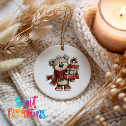 teddy bear in a red scarf carrying Christmas gifts ceramic Christmas ornament styled on a cozy knit blanket