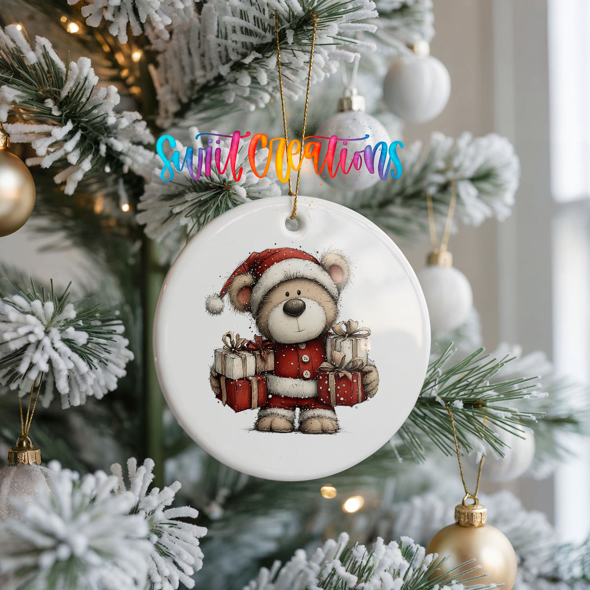 teddy bear dressed as Santa carrying Christmas gifts ceramic Christmas ornament hanging on a frosted Christmas tree