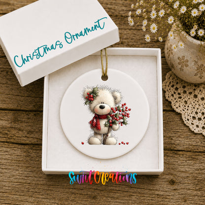 teddy bear with holly and red berries ceramic Christmas ornament presented in a gift box