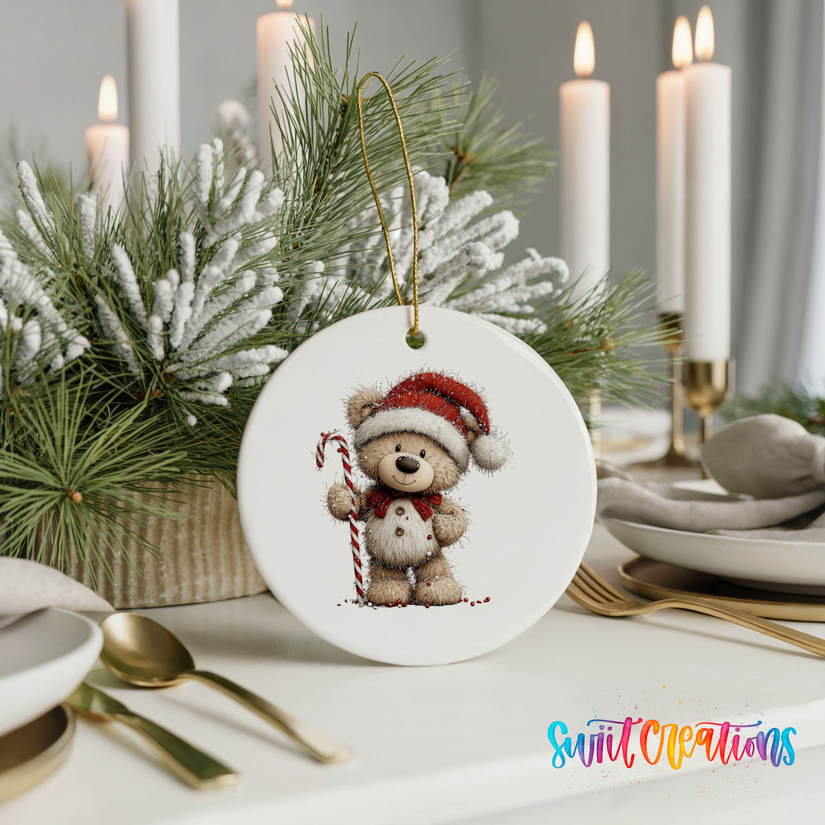 teddy bear wearing a Santa hat and holding a candy cane ceramic Christmas ornament shown in a holiday table setting