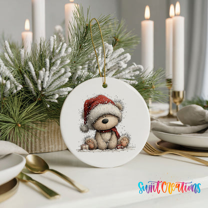 seated teddy bear in a red Santa hat ceramic Christmas ornament shown in a holiday table setting
