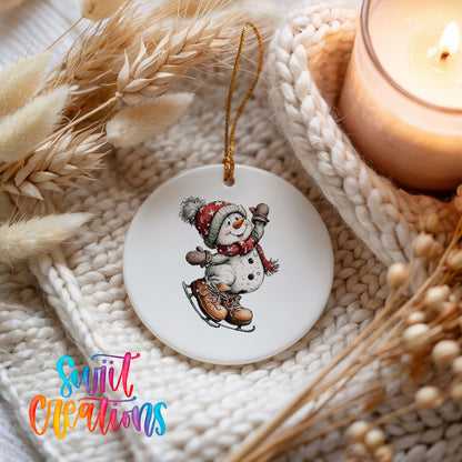 snowman ice skating in a red winter hat ceramic Christmas ornament styled on a cozy knit blanket