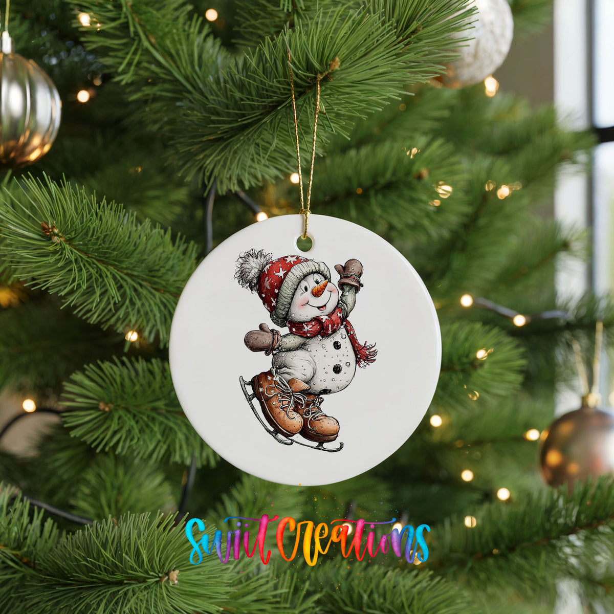 snowman ice skating in a red winter hat ceramic Christmas ornament hanging on a lit Christmas tree