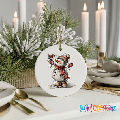 cheerful snowman waving in a red winter hat ceramic Christmas ornament shown in a holiday table setting