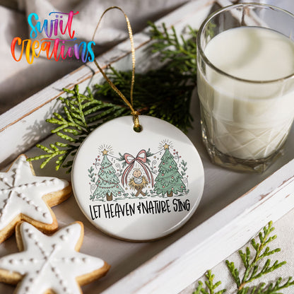 Let Heaven and Nature Sing church and winter trees design ceramic Christmas ornament styled with holiday cookies and a candle
