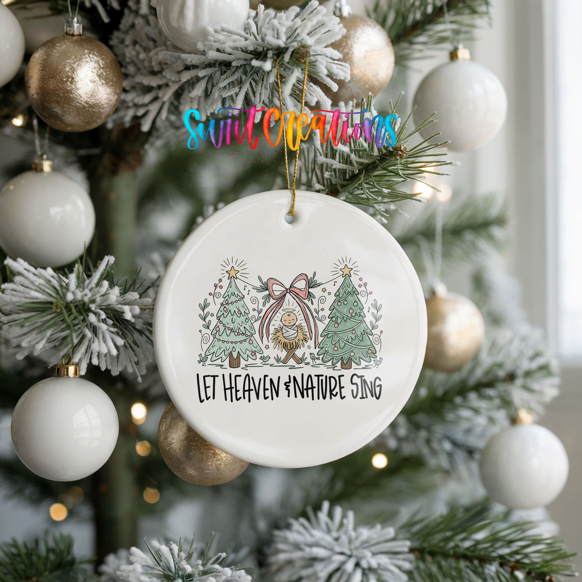 Let Heaven and Nature Sing church and winter trees design ceramic Christmas ornament hanging on a frosted tree with ornaments
