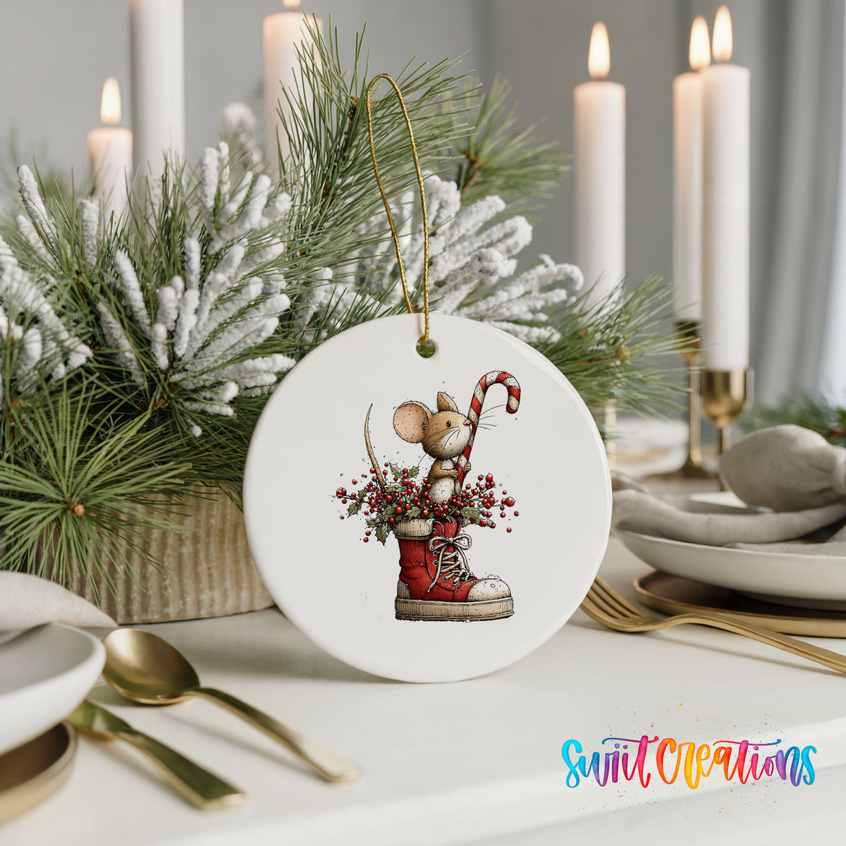 woodland mouse with a candy cane in a Christmas stocking ceramic Christmas ornament shown in a holiday table setting