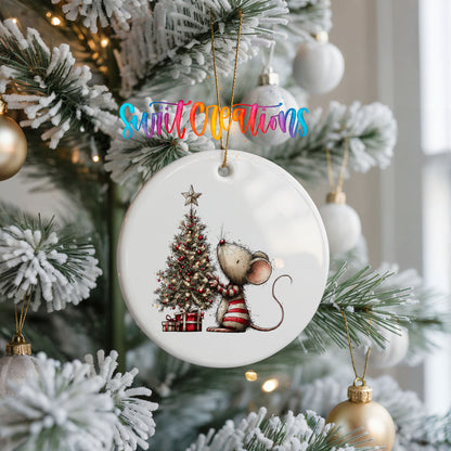 woodland mouse beside a decorated Christmas tree ceramic Christmas ornament hanging on a frosted Christmas tree