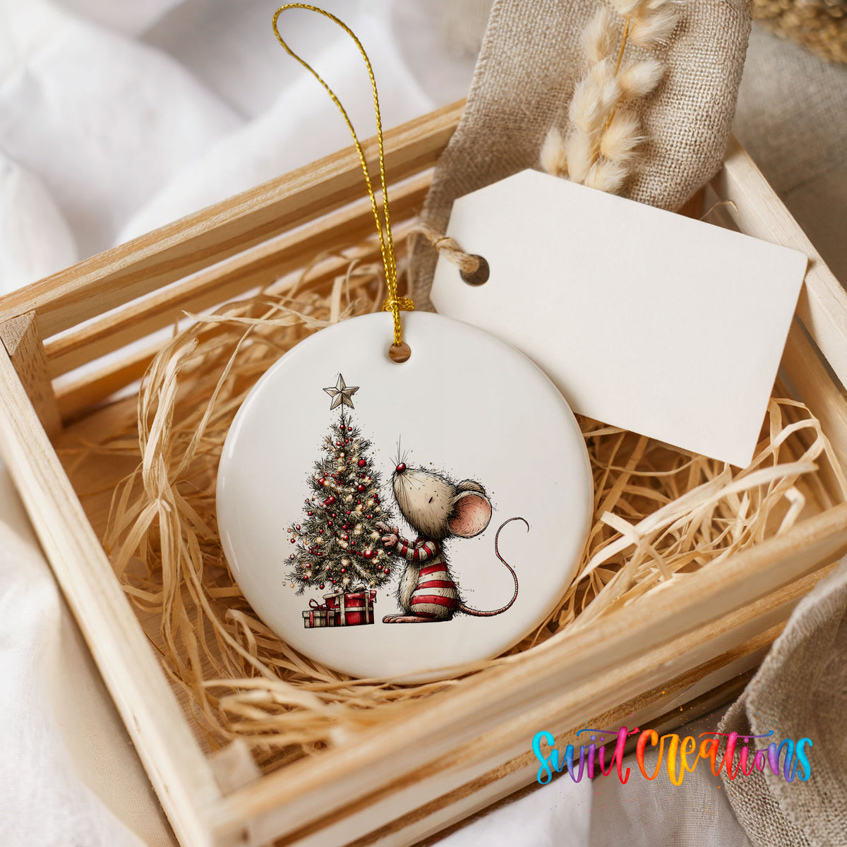 woodland mouse beside a decorated Christmas tree ceramic Christmas ornament displayed in a wooden gift crate