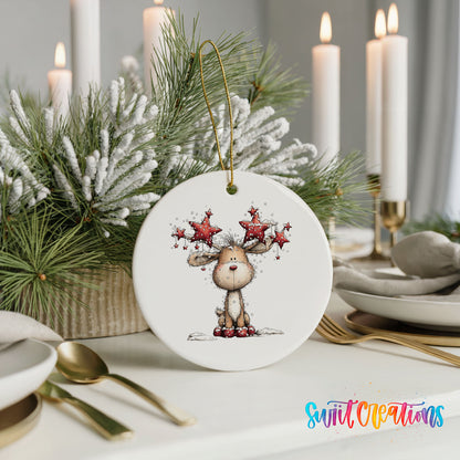 woodland reindeer with red stars on its antlers ceramic Christmas ornament shown in a holiday table setting