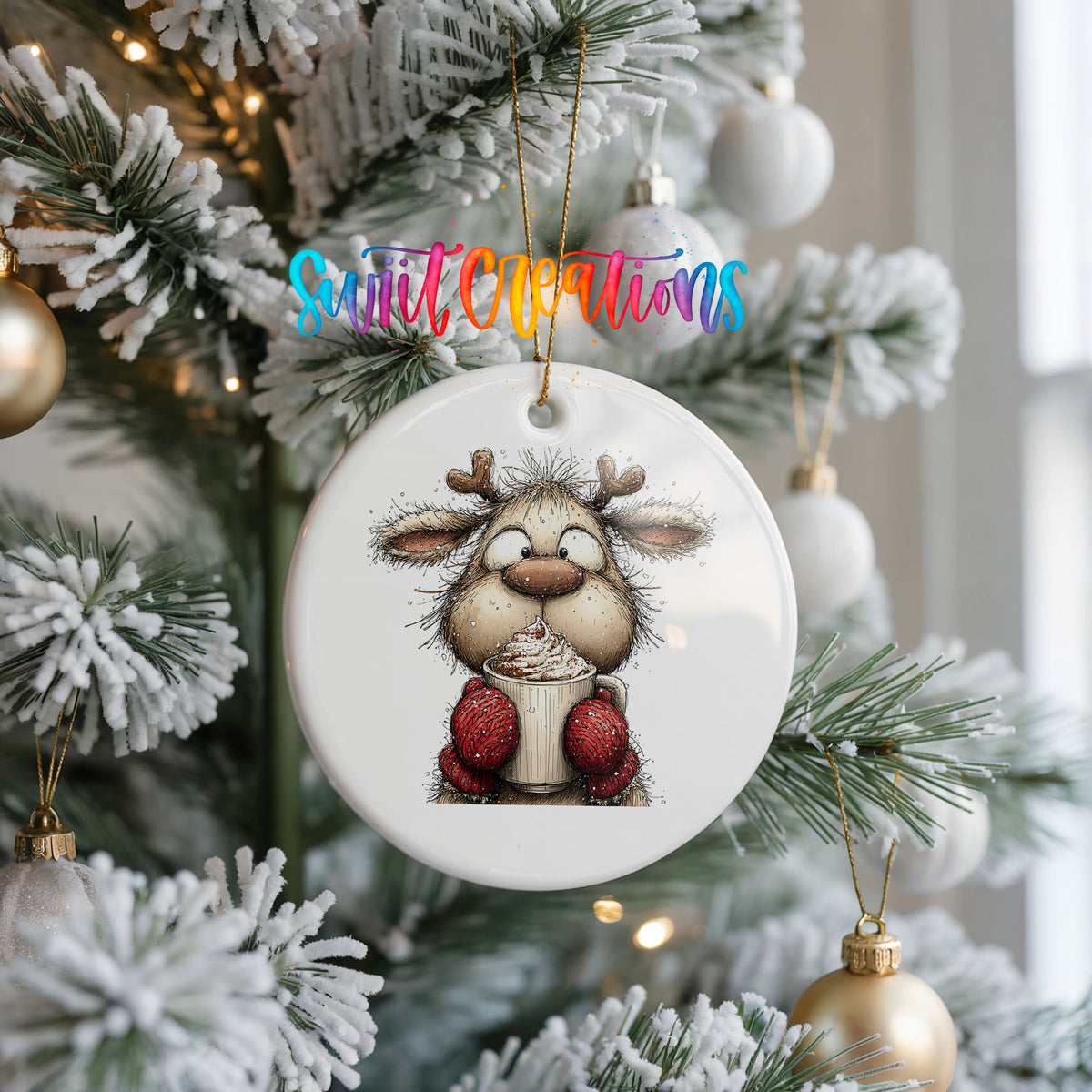 woodland reindeer wearing red mittens ceramic Christmas ornament hanging on a frosted Christmas tree