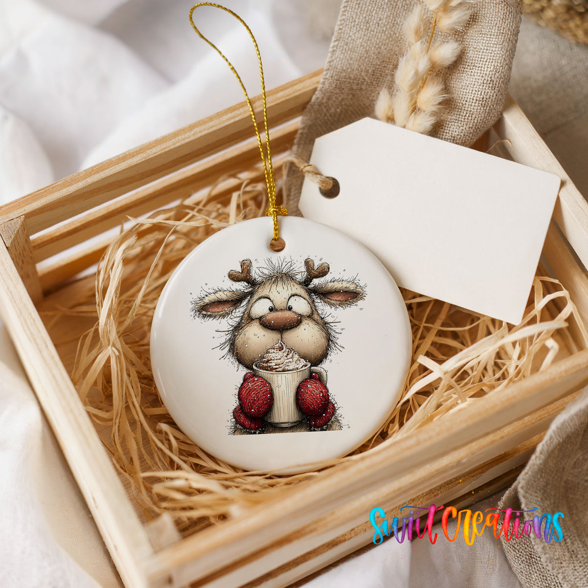 woodland reindeer wearing red mittens ceramic Christmas ornament displayed in a wooden gift crate